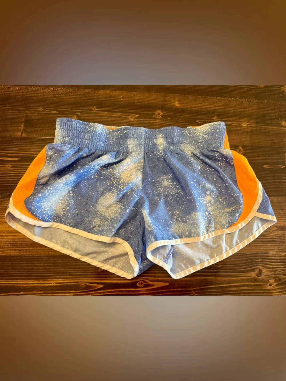Nike Dri Fit Women’s Blue Splatter Running Shorts with Orange Side Panels M‎